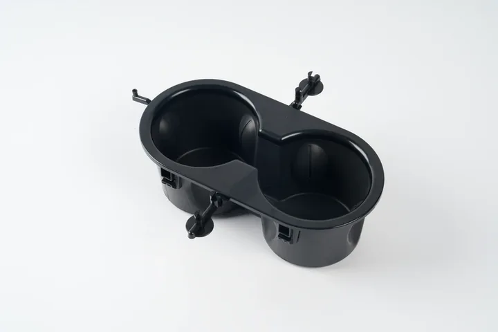 Black injection molded functional component