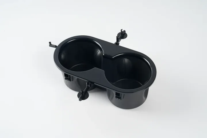 Molded Cup Holder Component Black injection molded cup holder component