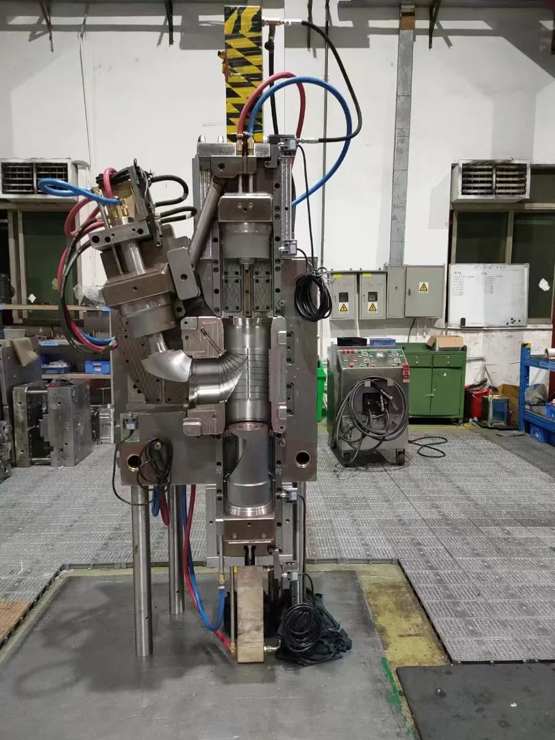 Large production injection mold standing in the tooling workshop