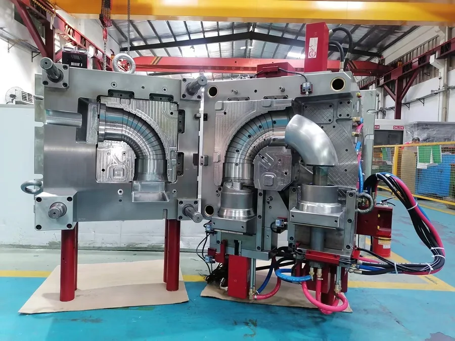 Production injection mold with curved cavity tooling